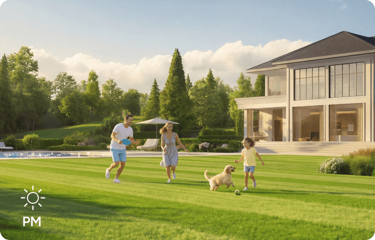 Family play with pets in the lawn mowed by iGarden L AWD Series robotic mower in the afternoon