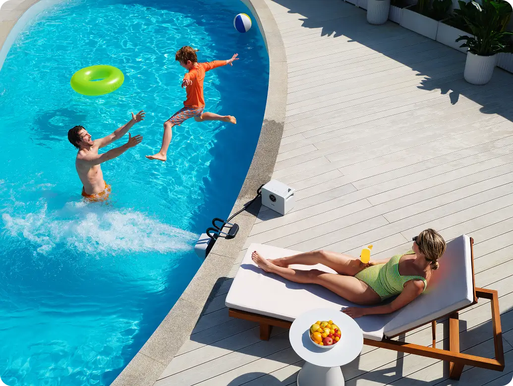 Family enjoying pool time with iGarden portable swim jet